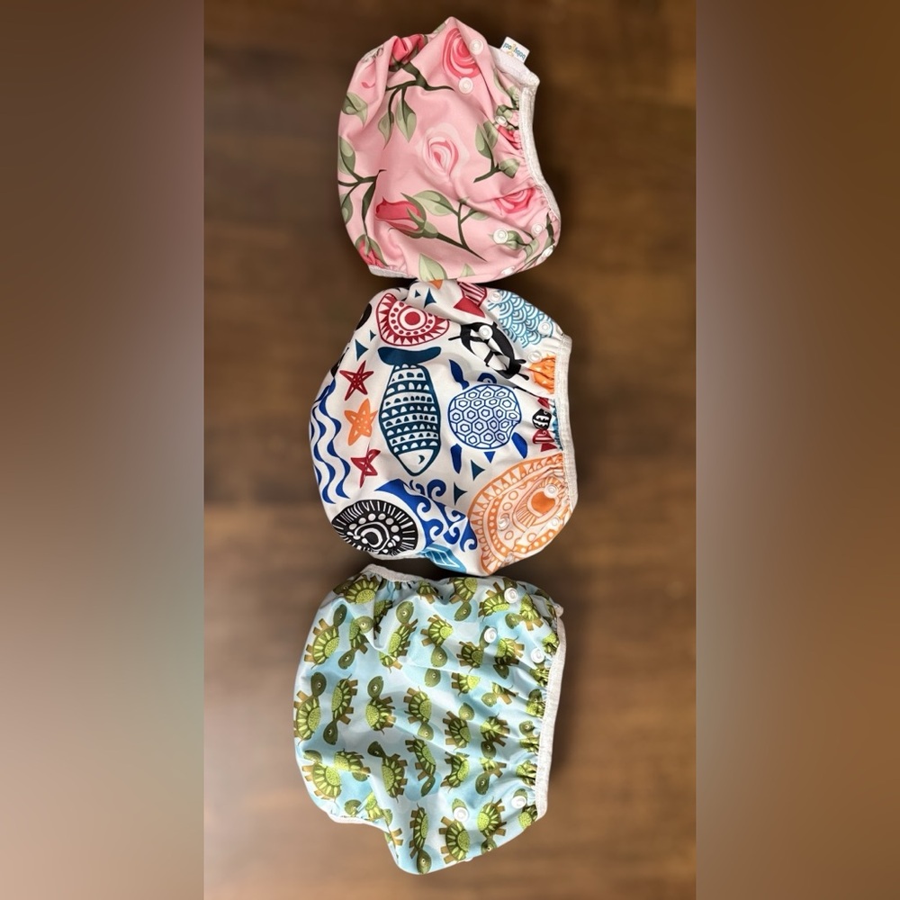Cloth diaper covers or reusable swim diapers. Set of 3 to Grow with Baby